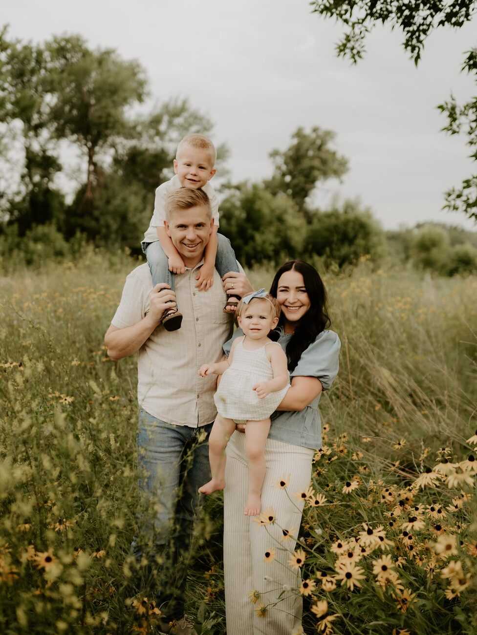 Jack Winders with his wife Josie and their two kids in a Minnesota field